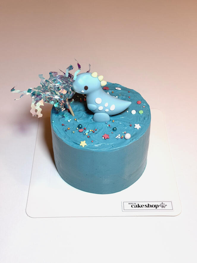 Dinosaur figure bento cake